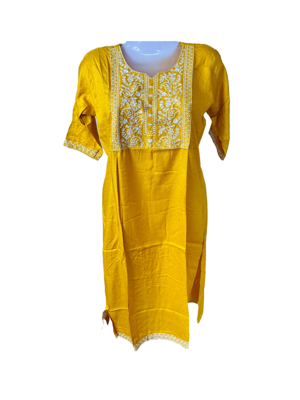 a yellow dress on a mannequin